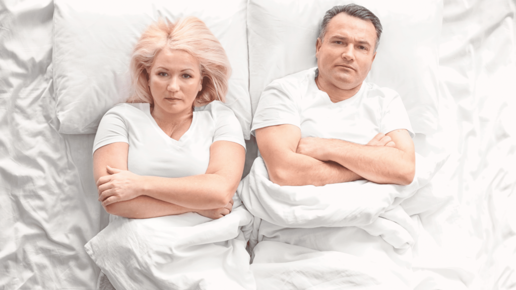 Divorcing couple laid in bed